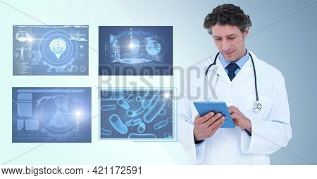 Composition of male doctor using tablet and screens with medical data processing. global medicine and healthcare concept digitally generated image.
