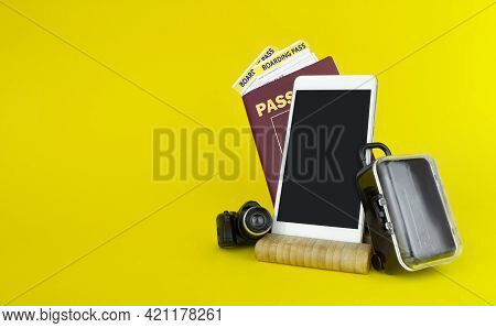 Passports, Plane Tickets, Smartfone And Suitcase Ready For Vacation. Travelling Concept.
