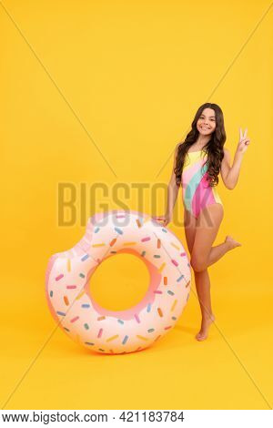 Tween With Swimming Ring. Child Hold Beach Accessory Of Inflatable Circle. Active Childhood.