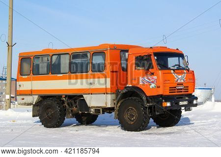 Novyy Urengoy, Russia - March 8, 2014: Offroad Shift Bus Kamaz 4326 In The City Street.