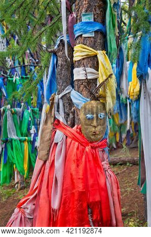 Masks In The Shamans Sanctuary. Mongolia. Lake Khuvsgul