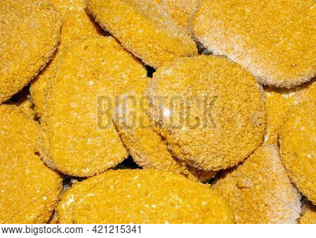 Raw Chicken Nuggets In Breadcrumbs Background.frozen Chicken Nuggets Top View.