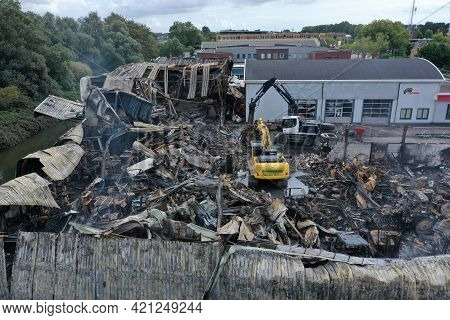 Grootebroek, The Netherlands - 4 September 2020: Cleaning Up After A Major Fire At An Agricultural M