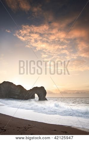 Colourful Winter Sunrises Behind Durdle Door On Jurassic Coast In England