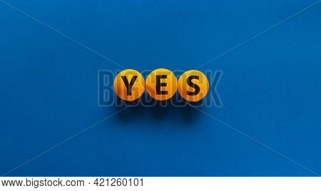 Yes Choice Symbol. Orange Table Tennis Balls With The Word 'yes'. Beautiful Blue Background. Busines