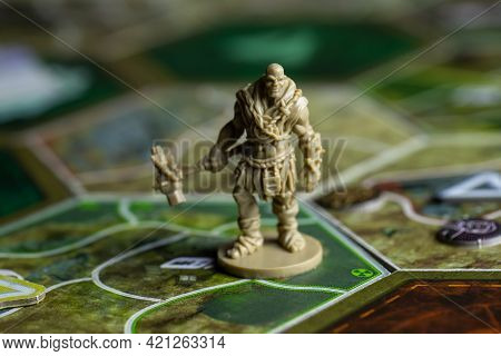 Roseville, Mn, Usa, 02.04.2021 - Fallout Board Game Plastic Enemy Figure On Map Tiles Selective Focu