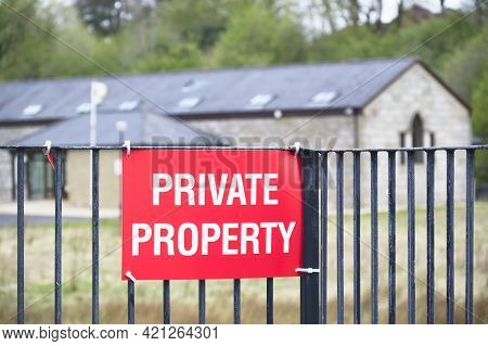 Private Property Red Sign On Entrance Gate
