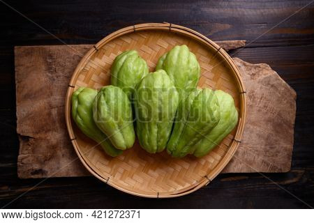 Chayote Squash Fruit (mirliton, Pipinola Or Choko) In A Basket On Wooden Background, Edible Fruit Ea
