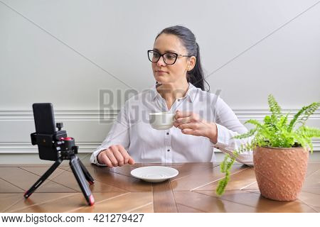 Young Woman Blogger Vlogger Recording Broadcast At Home