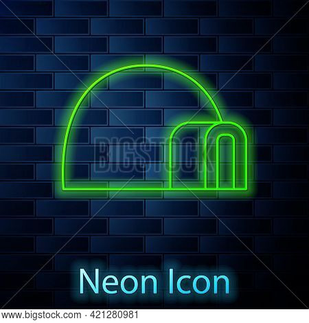 Glowing Neon Line Igloo Ice House Icon Isolated On Brick Wall Background. Snow Home, Eskimo Dome-sha