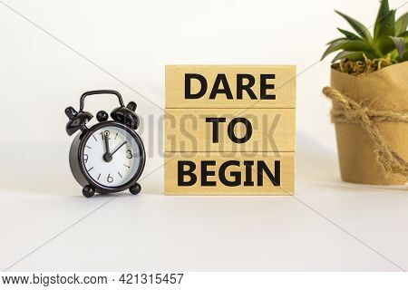Dare To Begin Symbol. Wooden Blocks With Words 'dare To Begin'. Beautiful White Background, Black Al