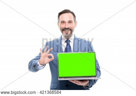 Office Manager Ready For Video Conference. Happy Grizzled Man Showing Laptop Screen.