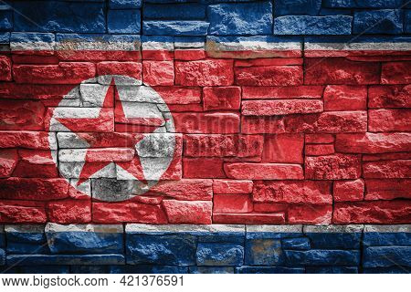 National Flag Of North Korea  On Stone  Wall Background.the Concept Of National Pride And Symbol Of 
