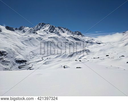 View Of The Fluelapss Above Davos Engadin. Beautiful Winter Landscape In The Winter Spring Time. Ski
