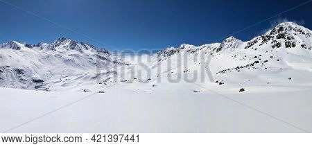 Large Mountain Panorama Picture. View Of The Fluelapss Above Davos. Beautiful Winter Landscape. Skit