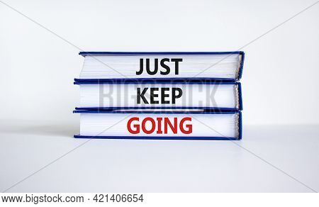 Just Keep Going Symbol. Books With Words 'just Keep Going'. Beautiful White Background. Business, Ju