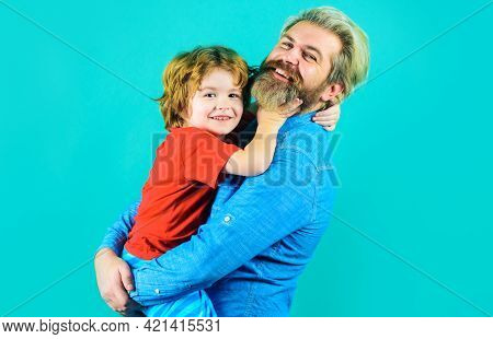 Fathers Day. Dad Hugs With Little Son. Family Relationships. Parentship Concept.