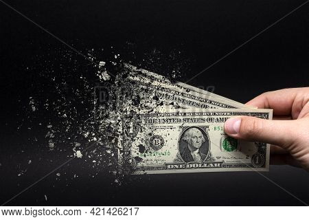 Spend Money, Spend All Your Money Illiterately. The Dollar Bill Turns To Ash, Dissolves Against A Bl