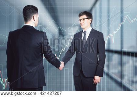 Two Businessmen Shaking Hands In The Office Corridor With Rising Chart In The Background, Agreement 
