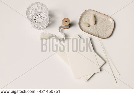Summer Stationery Still Life Scene With Dry Bunny Tails, Lagurus Grass. Glass Of Water, Cocktail In 