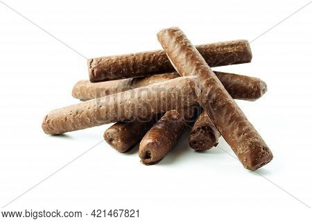 A Slide Of Corn Sticks In Chocolate On A White Background In A Close-up With Shadows Isolated
