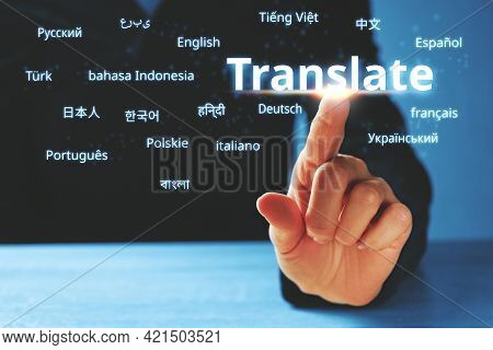 Person Abstractly Presses On The Display With The Word Translate And Foreign Languages.