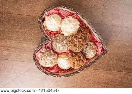 Cocada, Coconut Candy From Brazil, White And Brown Heart-shaped Wooden Cocadas, Top View.