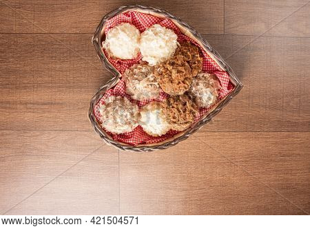 Cocada, Coconut Candy From Brazil, White And Brown Heart-shaped Wooden Cocadas, Top View.