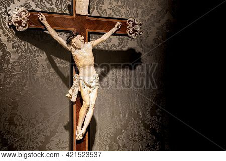 Turin, Italy - Circa May 2021: Old Crucifix Made Of Wood And Ivory (1750). Jesus Christ Symbol Of Re