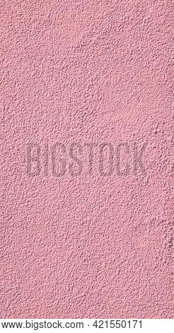 Texture Of A Plasterwork Painted In Pink Used As An Exterior Coating On A Building. An Abstract Vert