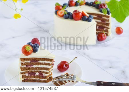 Top View On Homemade Vanilla Birthday Cake Decorated With Berries: Strawberries, Blueberries, Cherri