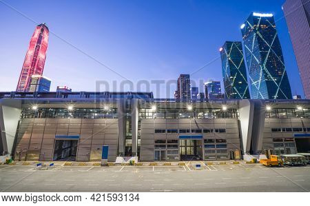 modern buildings in china shenzhen futian from elevated walkway at night