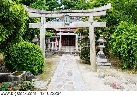 Fushimi Inari Taisha Shrine In Kyoto, Japan With Beautiful Red Gate And Japanese Garden. Red Torii G