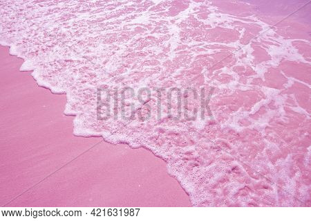 Pop Art Surreal Style Ocean Waves Splashing On Pink Colored Sand Beach