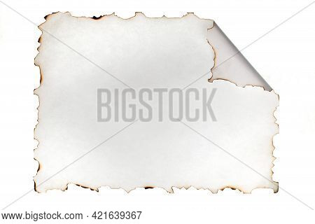 White Sheet With Burnt And Curled Edges. Isolated On White. Top View. Copy Space.