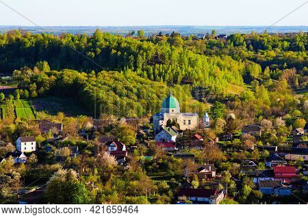 Scenic Aerial Landscape View Of Kremenets Town During Sunset. Aerial View From The Bona Mountain. Tr