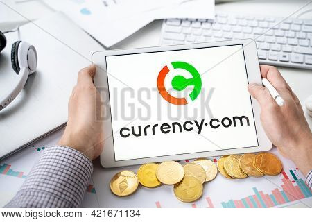 Russia Moscow 06.05.2021.tablet With Logo Of Cryptocurrency Stock Exchange Currency.com.trading Bloc