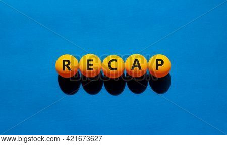 Recap Symbol. Orange Table Tennis Balls With The Words 'recap'. Beautiful Blue Background, Copy Spac