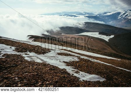 Scenic Alpine Landscape With Layers Of Mountains To Horizon In Dense Low Clouds. Wonderful Layered M