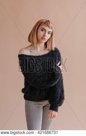Short brown hair woman in a studio shoot