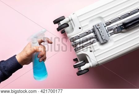 Prevention Concepts On Coronavirus ( Covid-19 ) Outbreak Situation With Person Cleaning Suitcase Bag