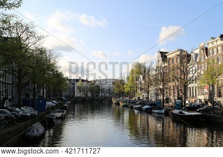 A Characteristic Canal In The City Of Amsterdam. High Quality Photo
