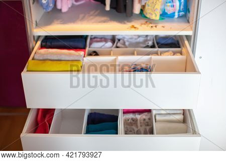 Vertical Storage Of Clothing. Clothing Folded For Vertical Storage In The Linen Drawer. Nursery. Sli