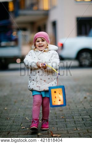 Little Kid Girl Holding Selfmade Lanterns With Candle For St. Martin Procession. Healthy Cute Toddle