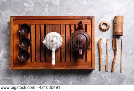 Beautiful Set For Traditional Tea Ceremony On Light Grey Marble Table, Flat Lay