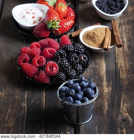 Berries, Cinnamon And Cream - Ingredients For Making A Homemade Cake