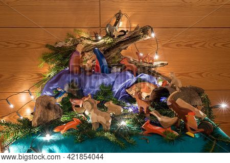 Crip With Fairy Lights And Alot Of Different Wood Animals