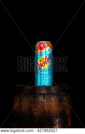 Can Of Ursus Cooler Beer On Beer Barrel With Dark Background. Illustrative Editorial Photo Shot In B
