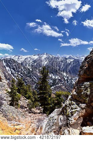 Wasatch Front Mount Olympus Peak hiking trail inspiring views in spring via Bonneville Shoreline, Ro