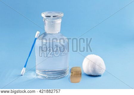 Reagent Bottle With Glass Stopper, With Hydrogen Peroxide Inside. Chemical Element H2 O2 In Laborato